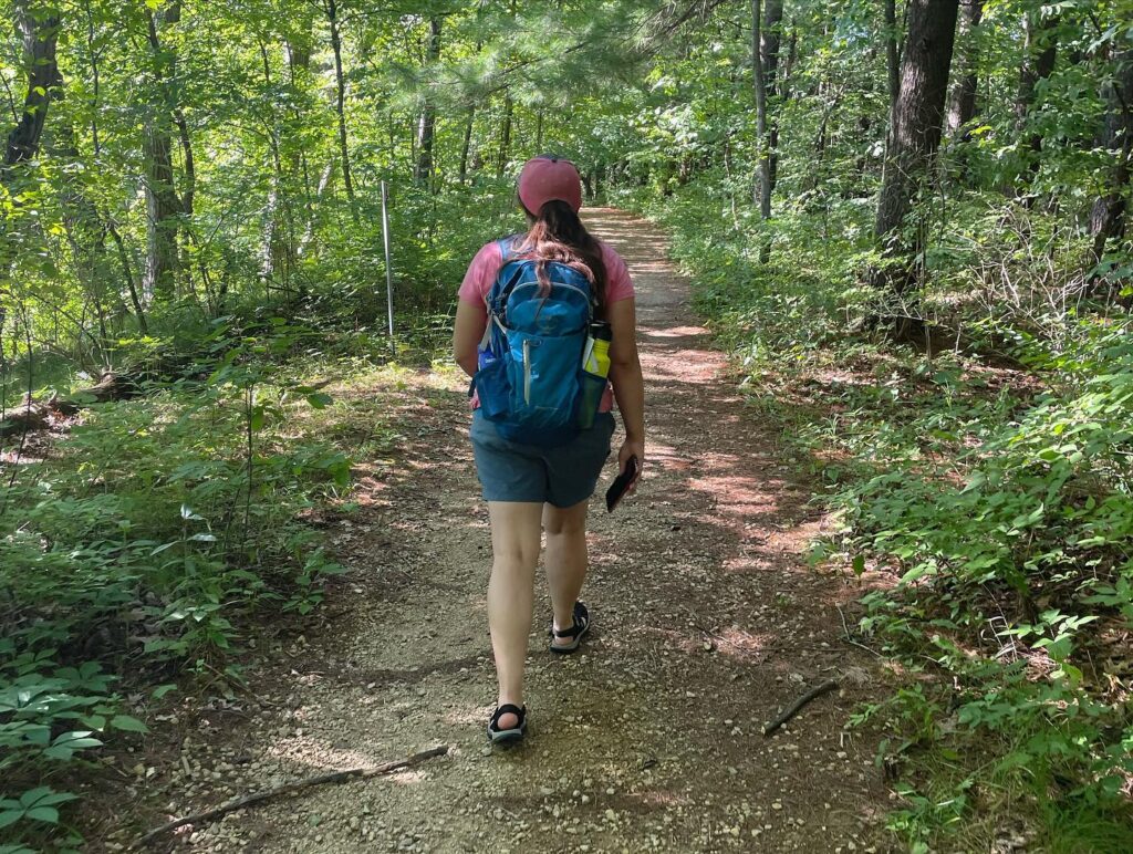 Photo of Jen hiking at Apple River Canyon State Park