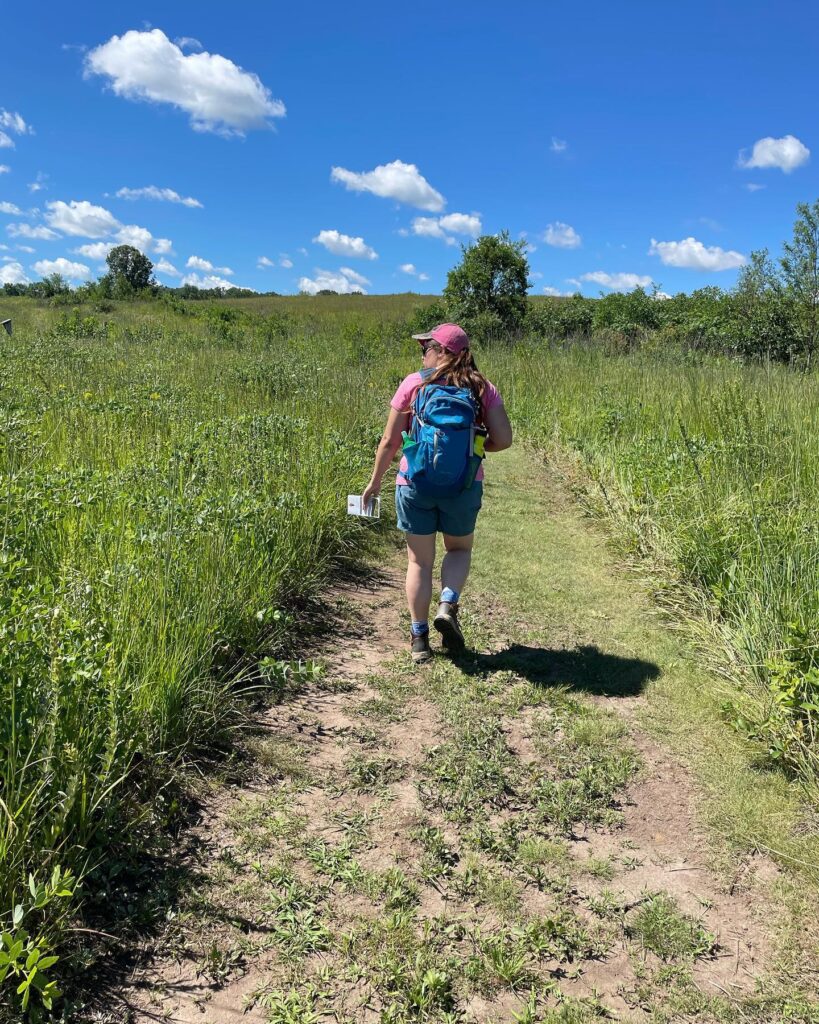 Photo of Jen hiking at Jarrett Prairie