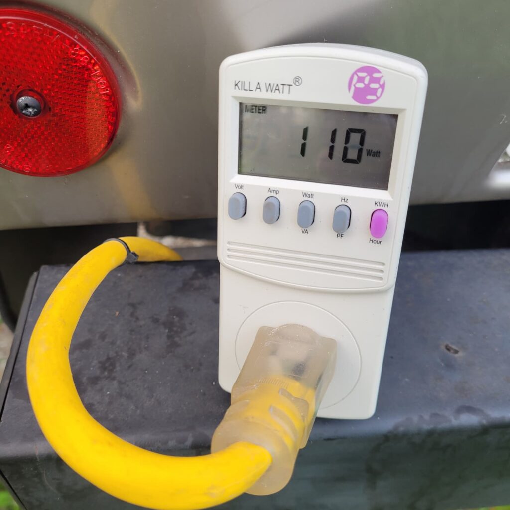 Photo of power meter reading 110 watts