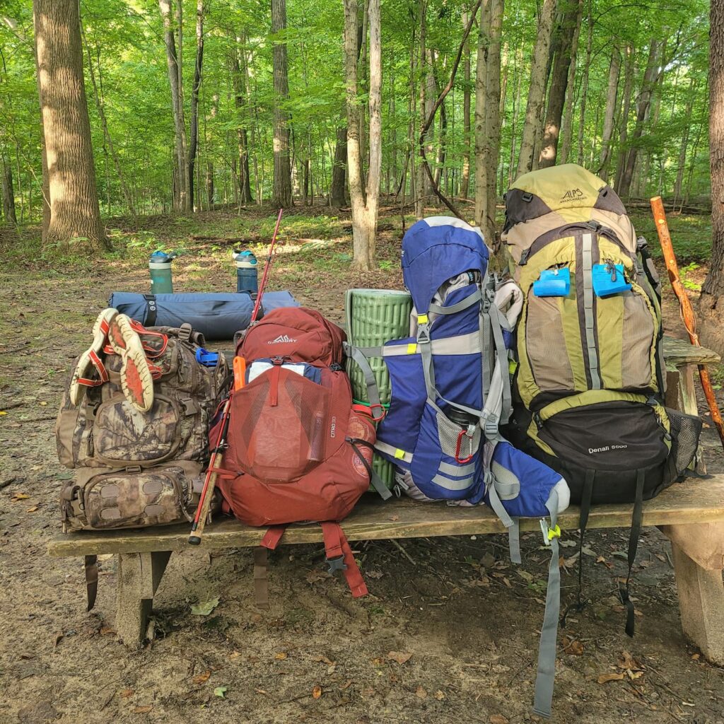 Backpacks in campsite at Forest Glen Preserve