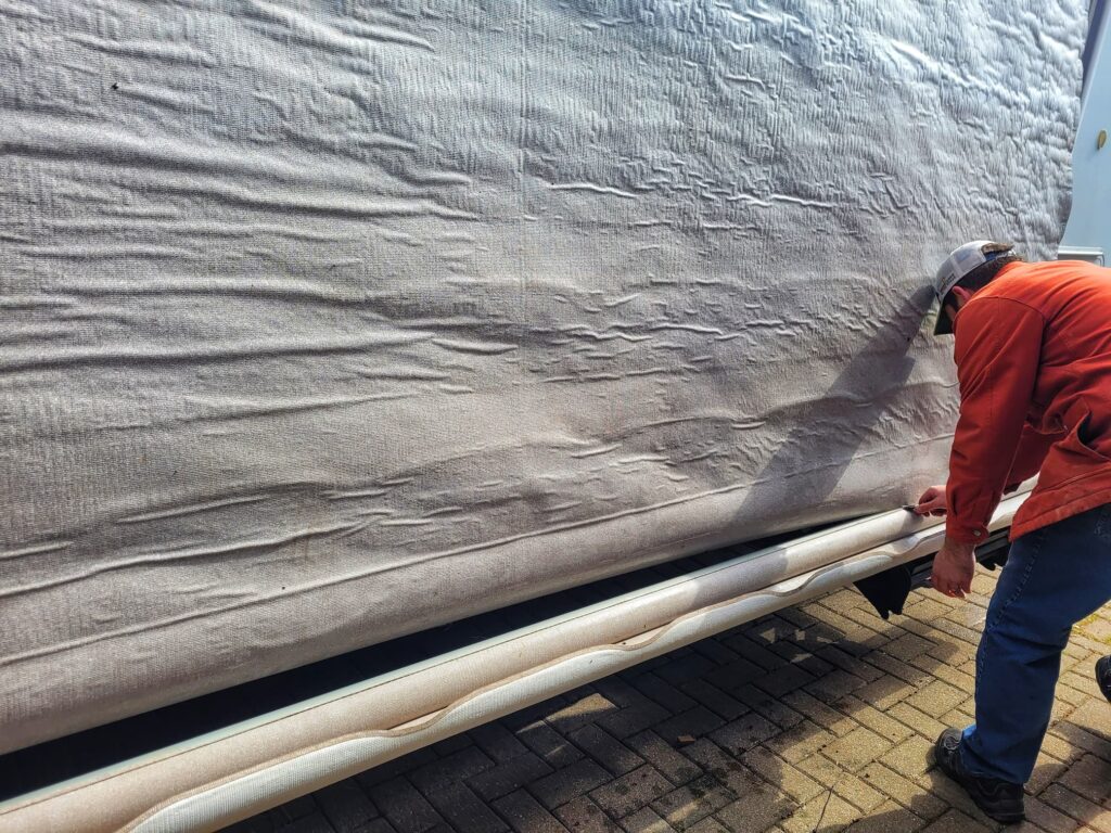 Photo of cutting an rv awning off