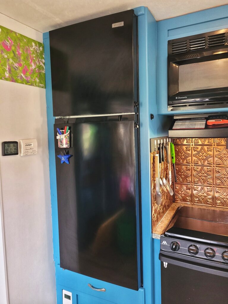 Photo of residential fridge in an RV