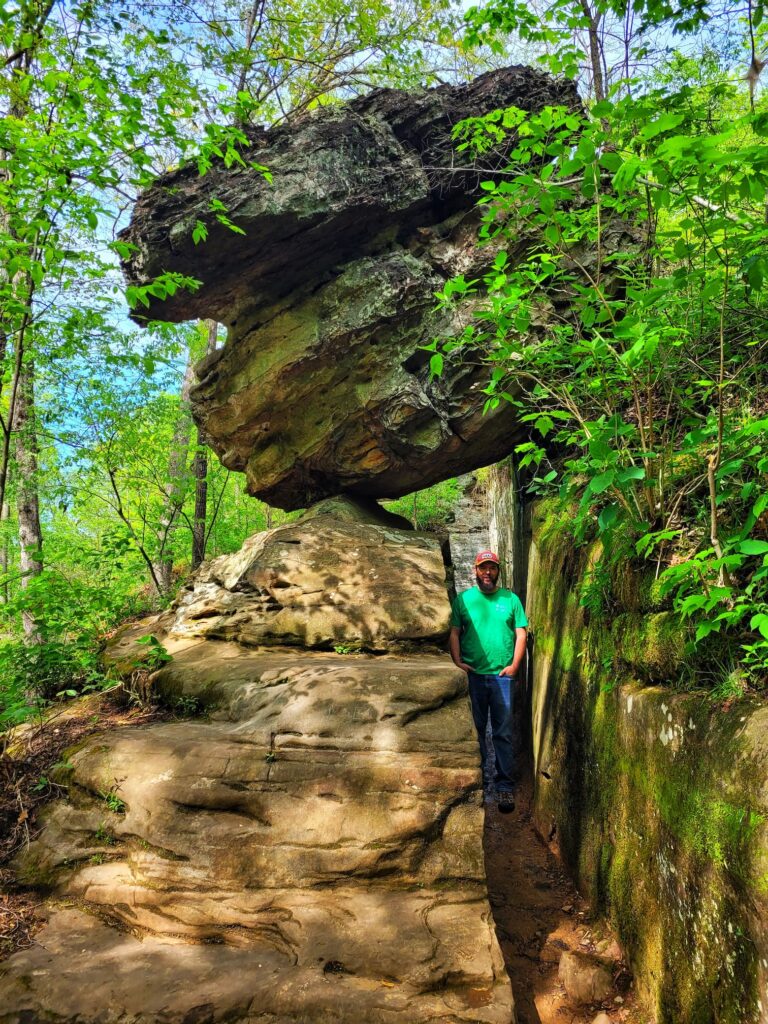 photo of josh under balanced rock