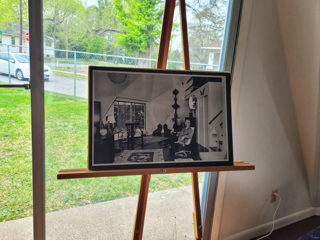 photo of easel with photo of Buckminster and Ann Fuller