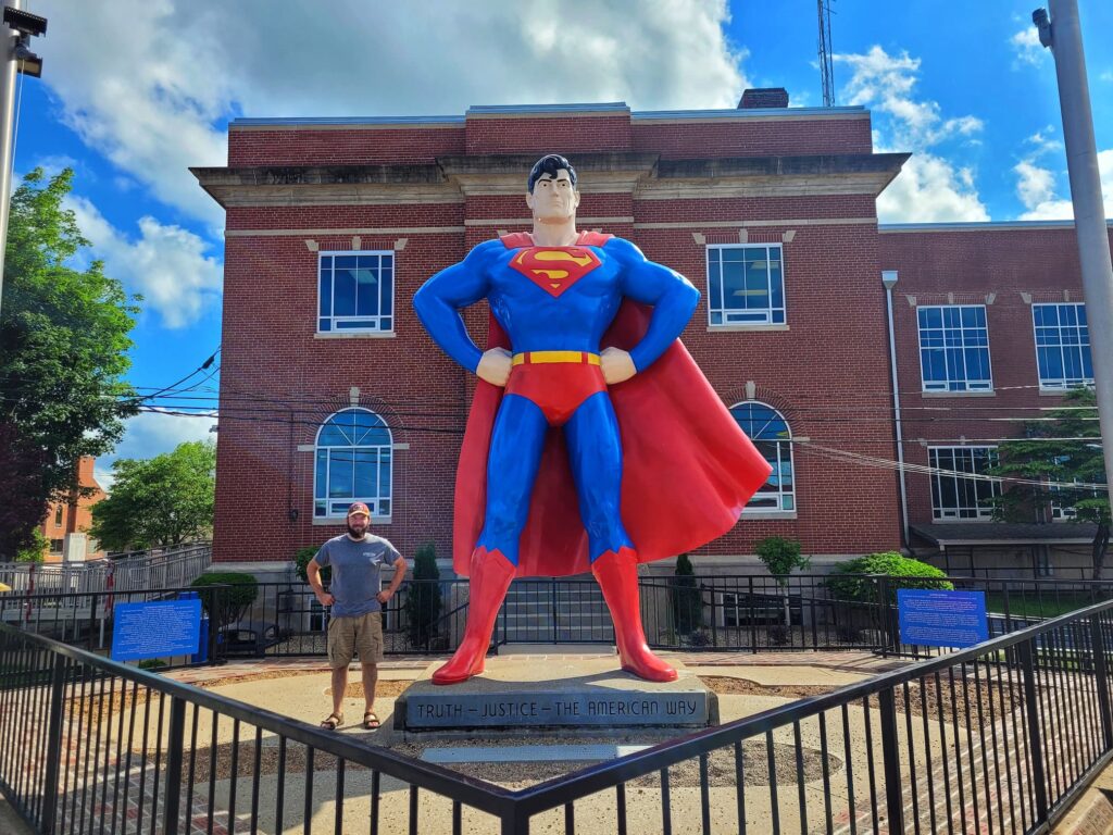 photo of Josh with the superman statue