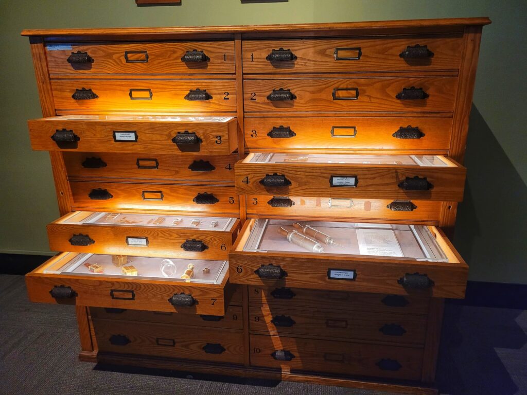 photo of cabinet of old medical tools