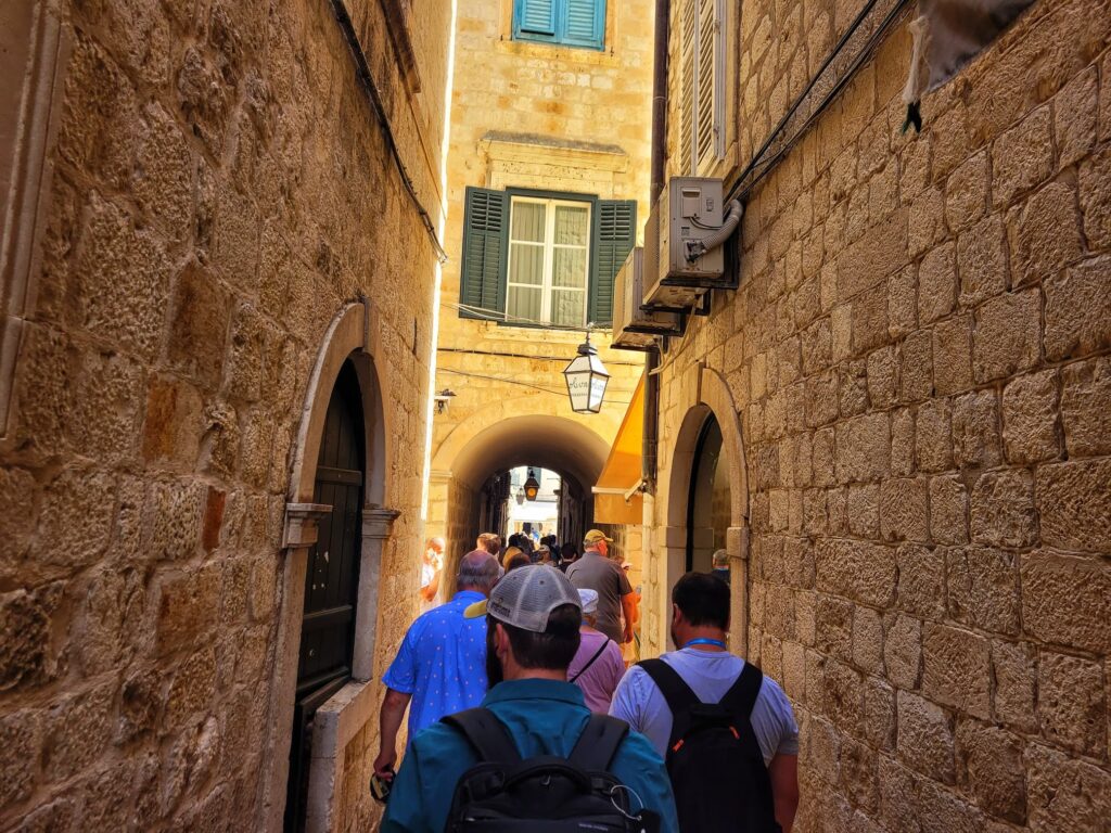 photo of our group walking in a Dubrovnik alley