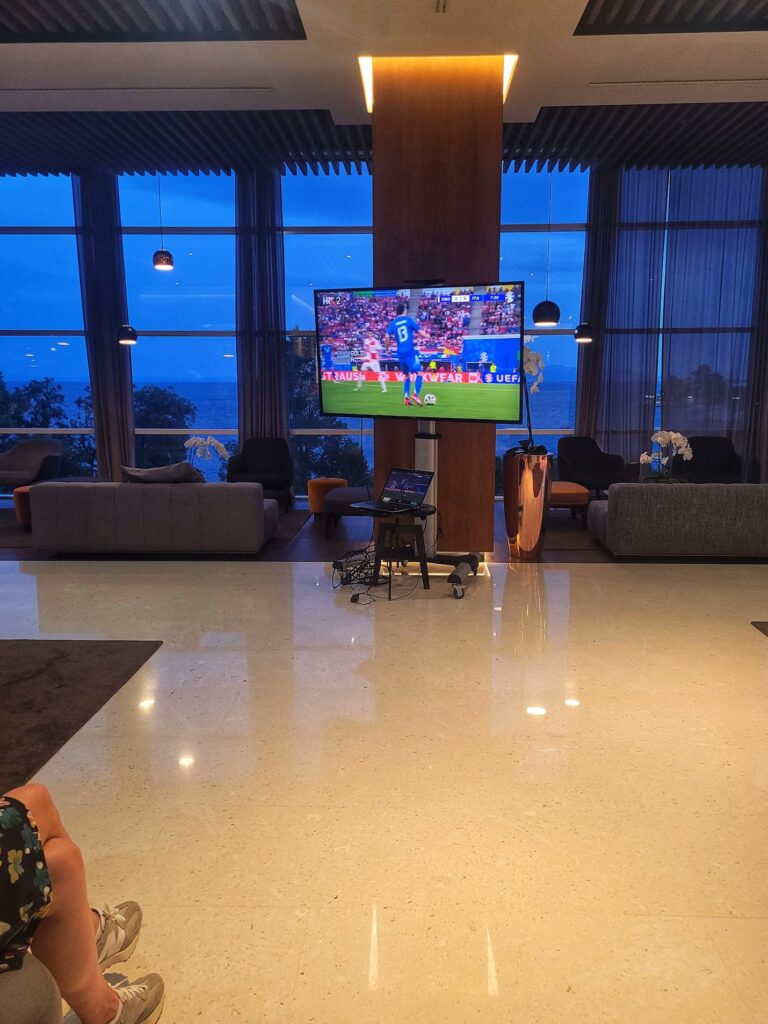 photo of tv with croatia football match in our hotel lobby