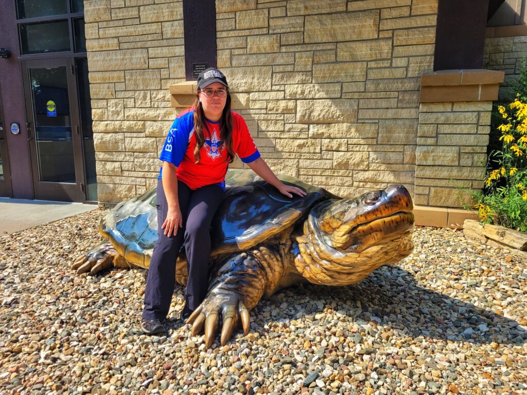 photo of Jen on a big turtle