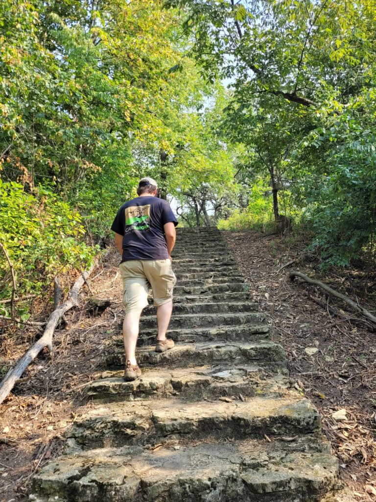 photo of josh climbing stairs at macktown living history