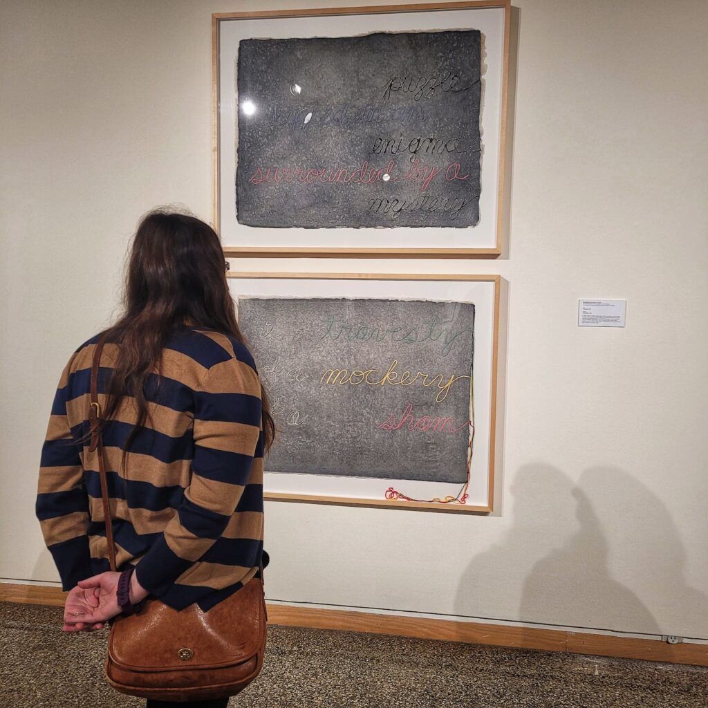 photo of jen looking at art