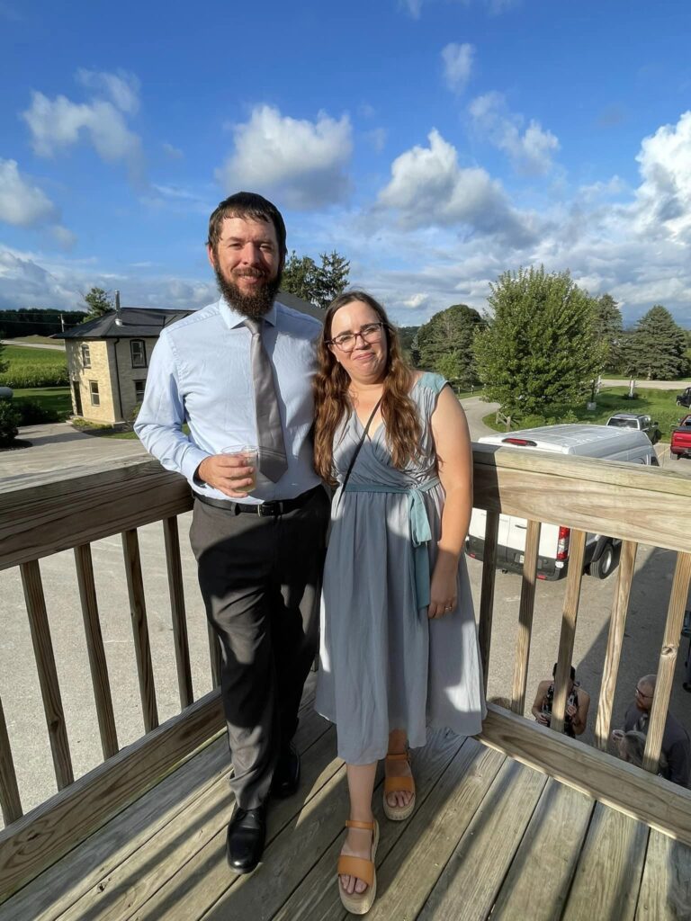 photo of josh and jen at a wedding