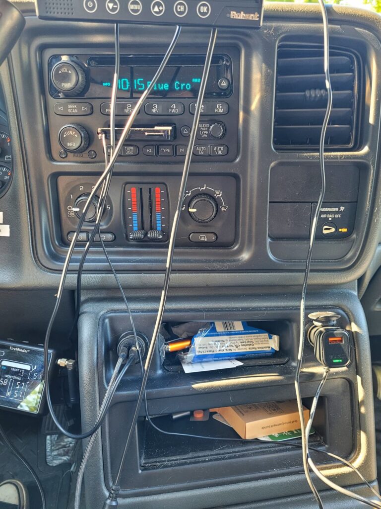 photo of truck dash with many cables