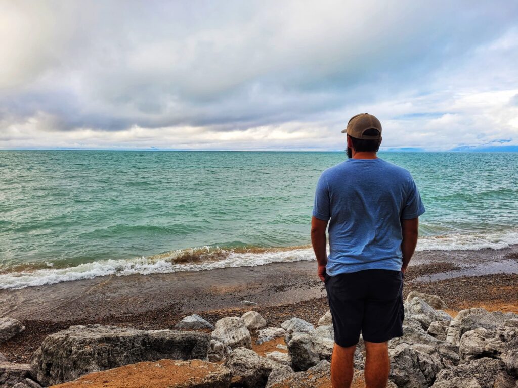 photo of josh looking at lake michigan