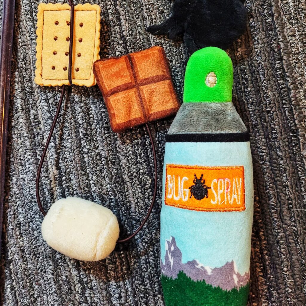 photo of camping themed pet toys