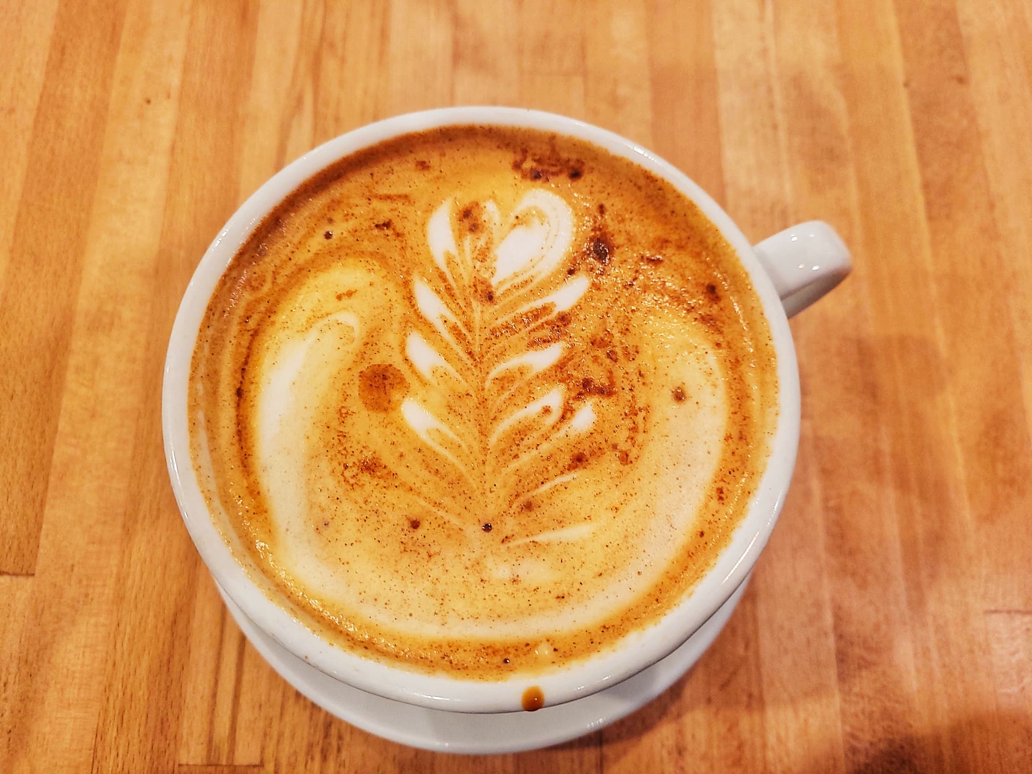 photo of sweet donkey coffee cinnamon bun latte