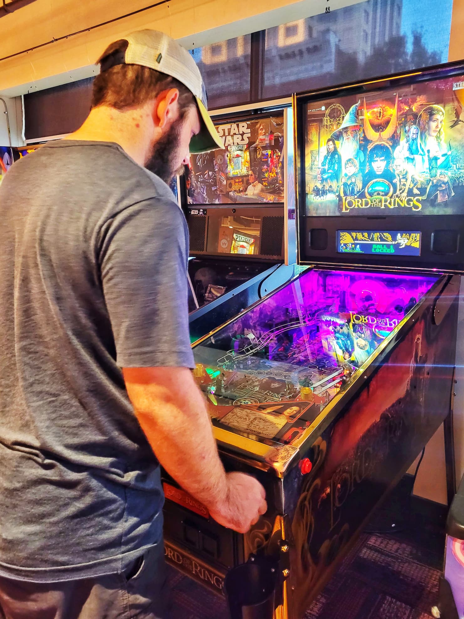 photo of josh playing pinball