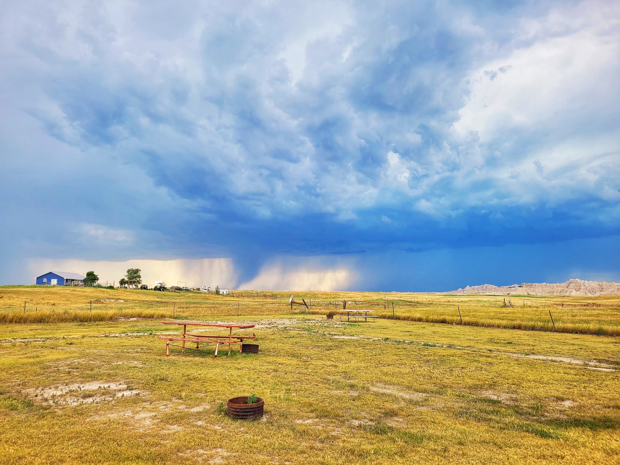 photo of storms over badlands