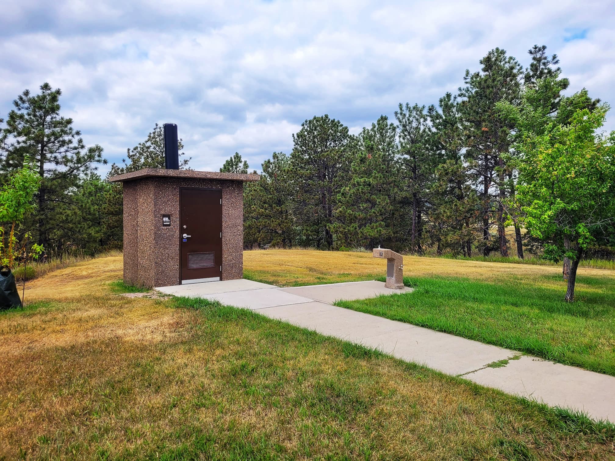 photo of angostura recreation area vault toilet