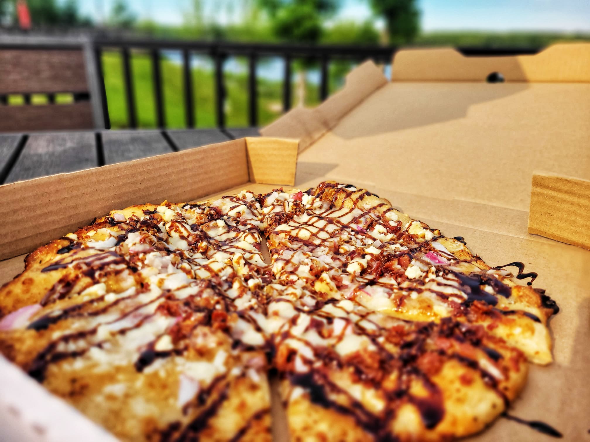 photo of the vineyards at pine lake pizza