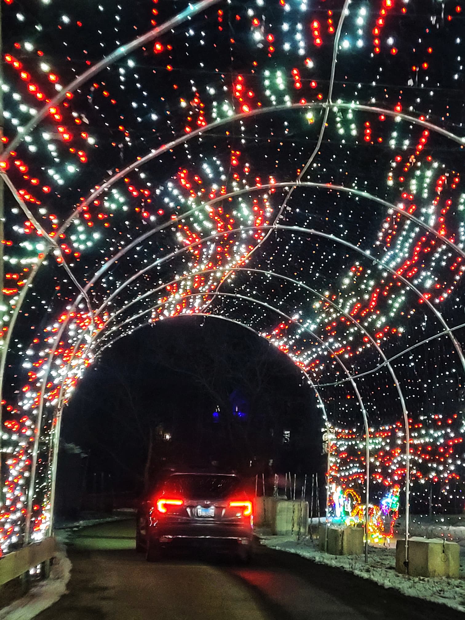 photo of santa's village magical christmas drive thru light tunnel