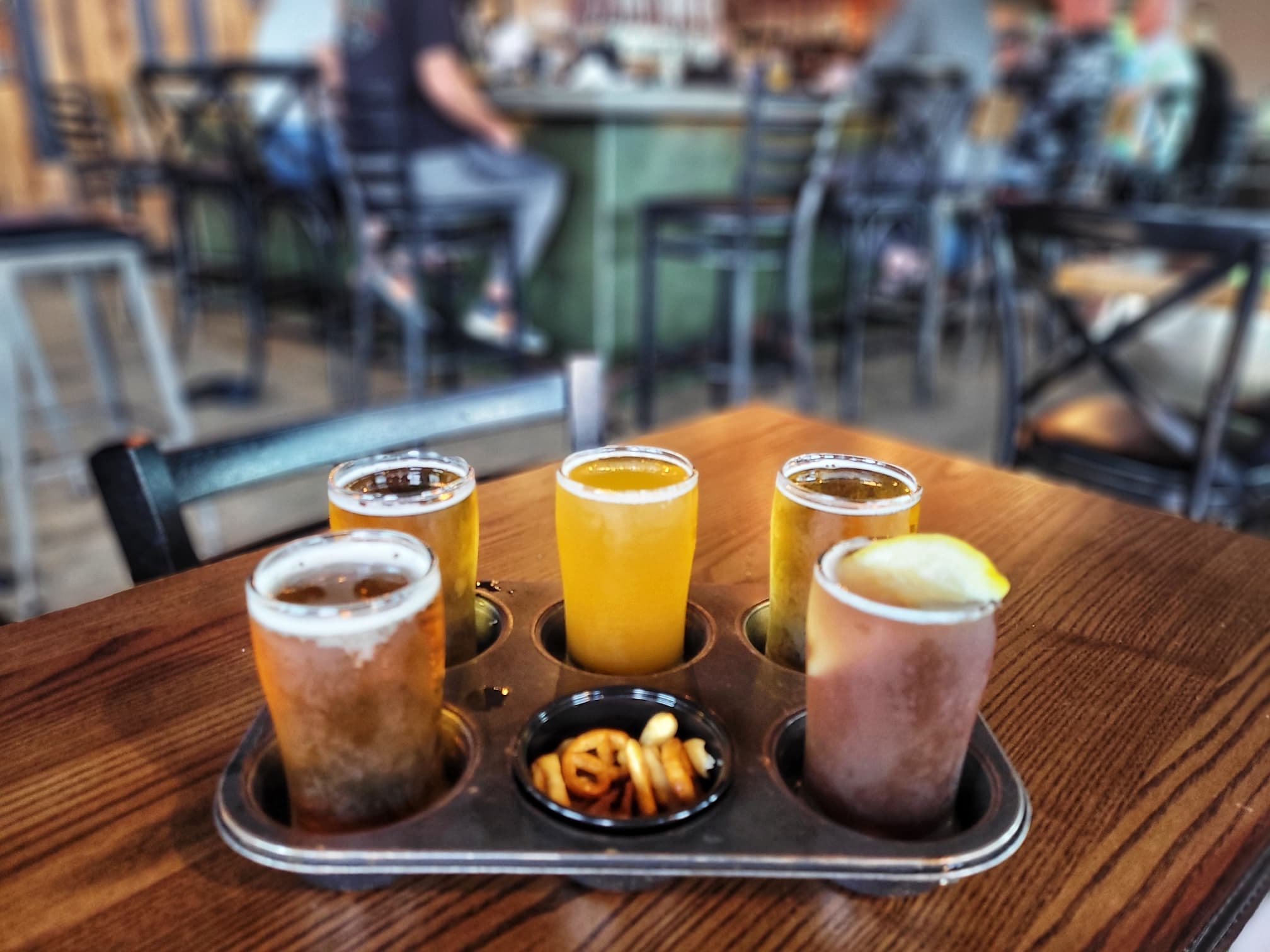 photo of tumbled rock brewing beer flight
