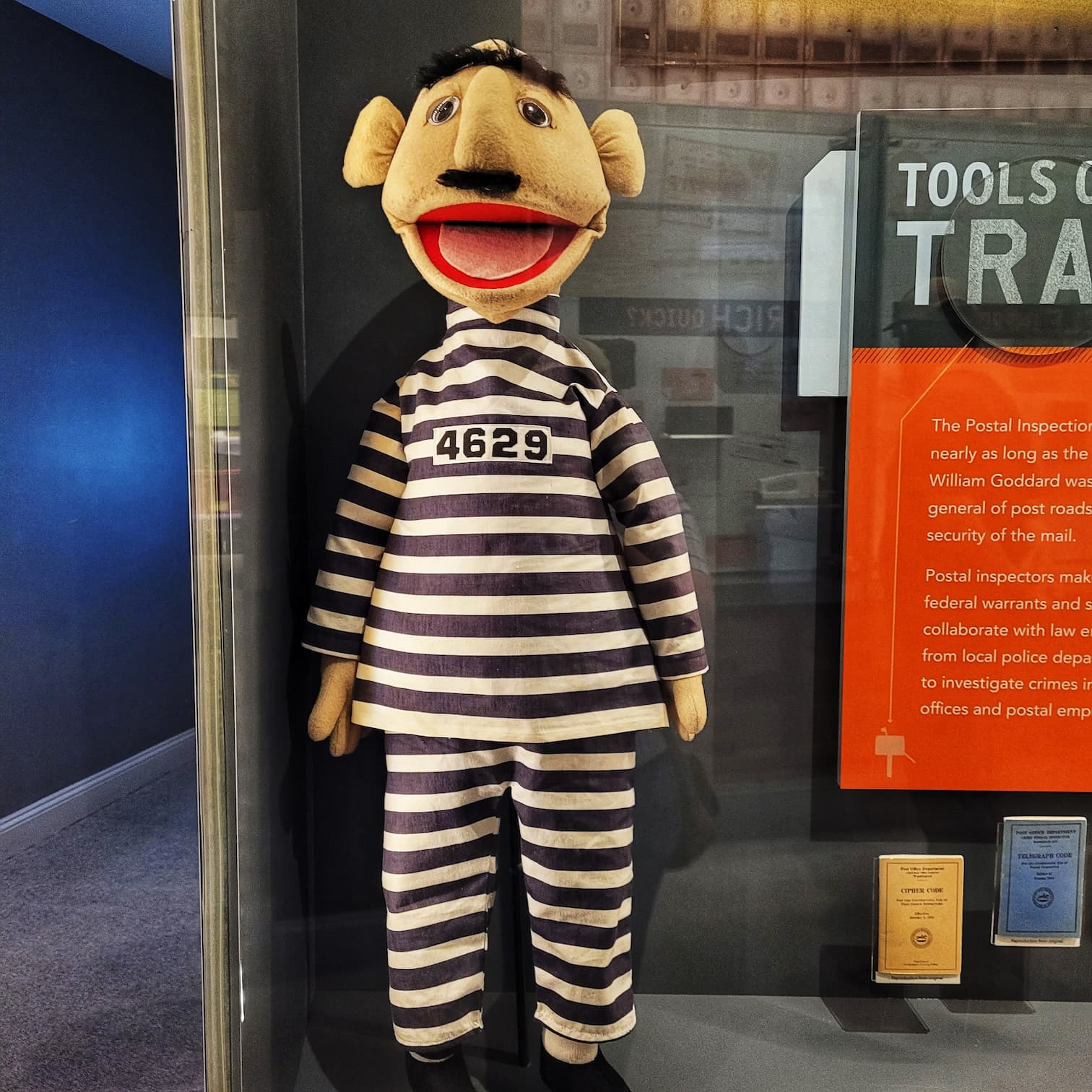 photo of usps inspector teaching puppet