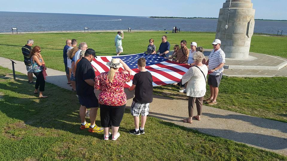 photo of folding the american flag at fort sumter