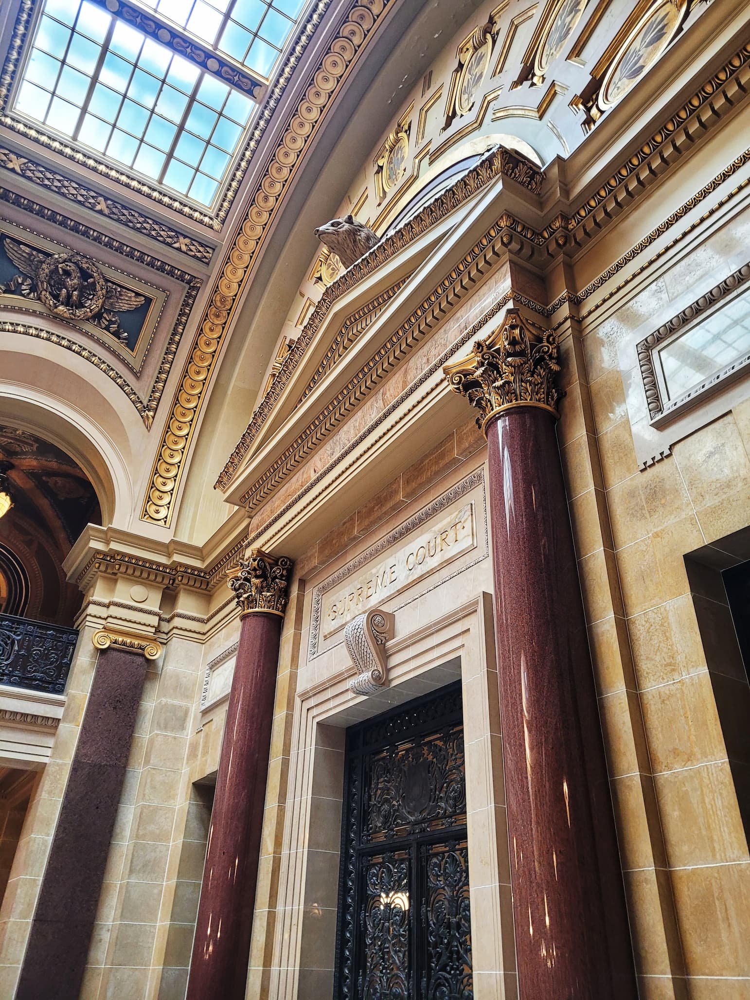 photo of wisconsin capitol supreme court chambers door with badger statue