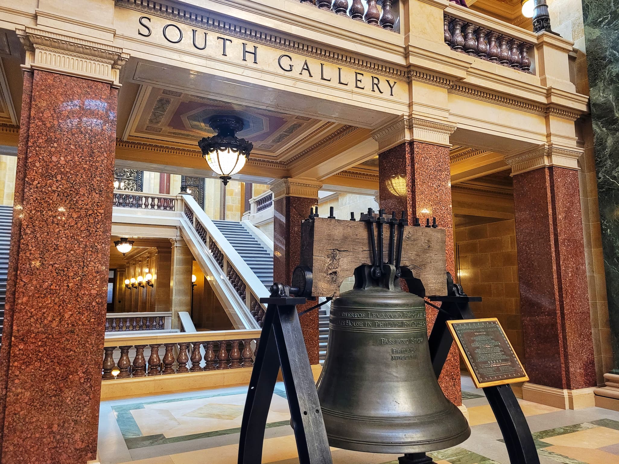 photo of wisconsin capitol rotunda balcony with wisconsin red granite columns
