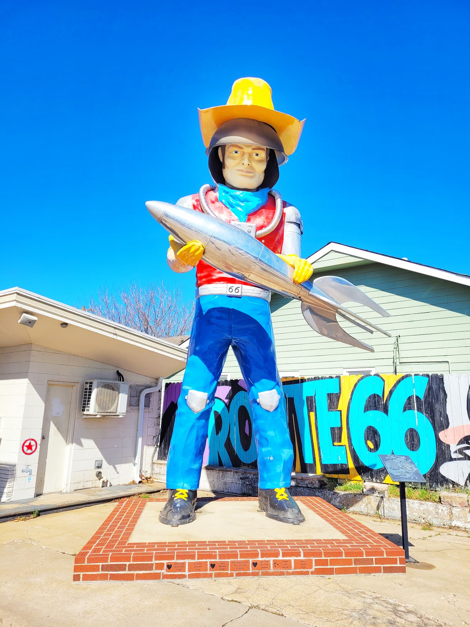 photo of buck atom muffler man