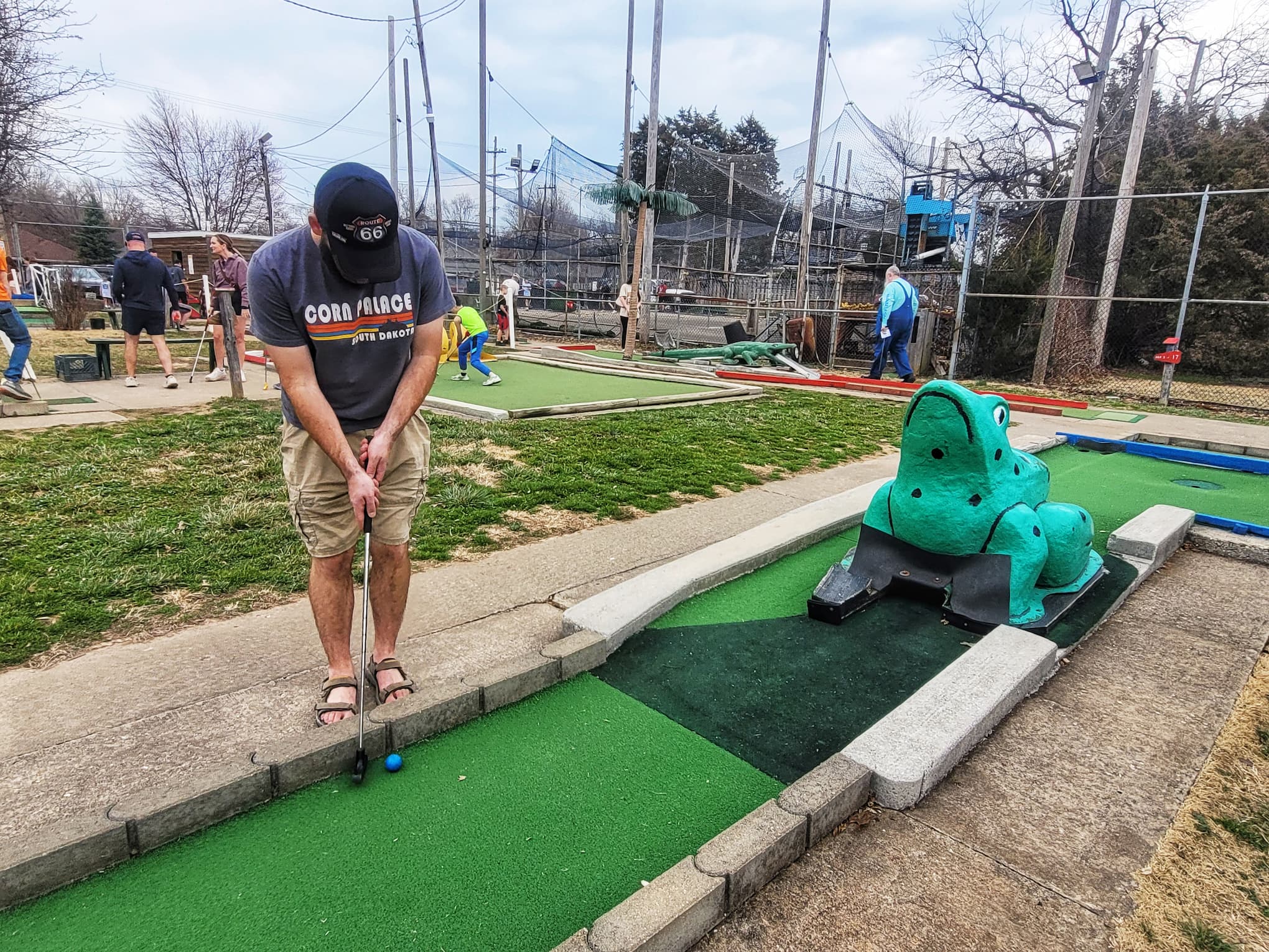 photo of josh playing mini golf at fun acre