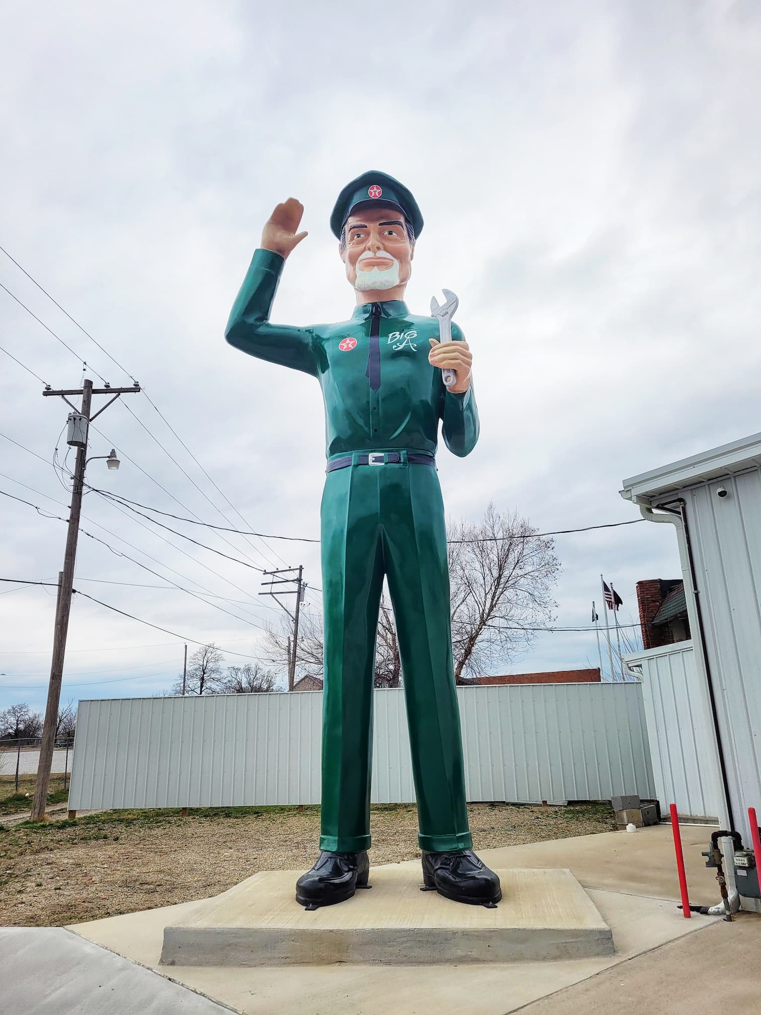 photo of gearhead curios muffler man