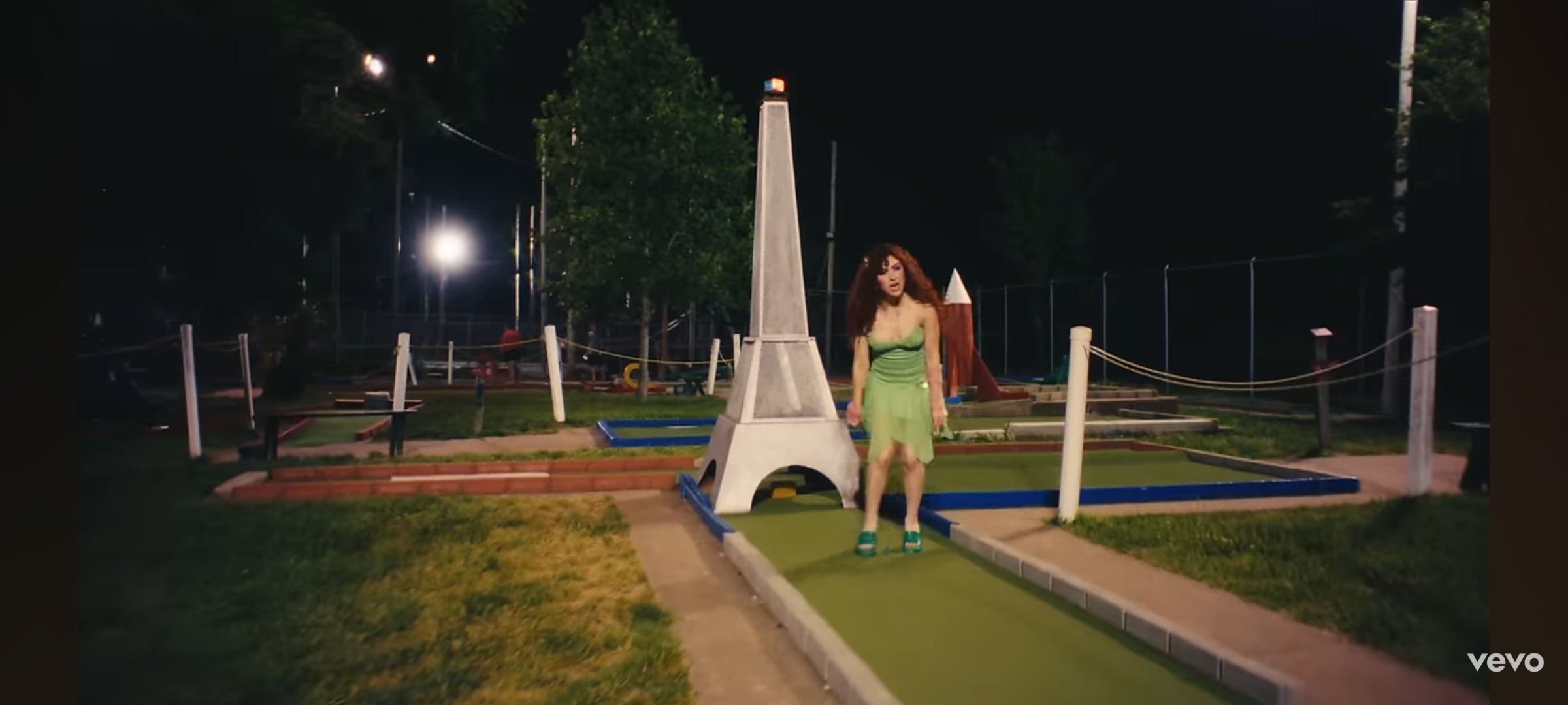 screenshot of hot to go music video at fun acre mini golf