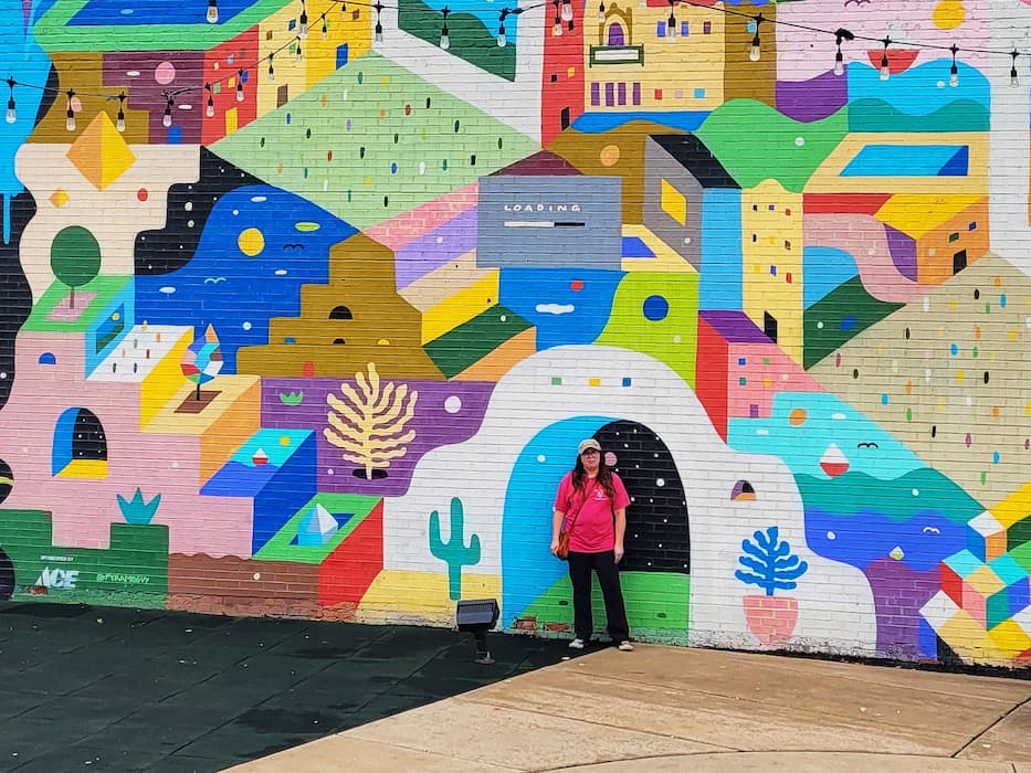 photo of jen in front of mural in miami oklahoma