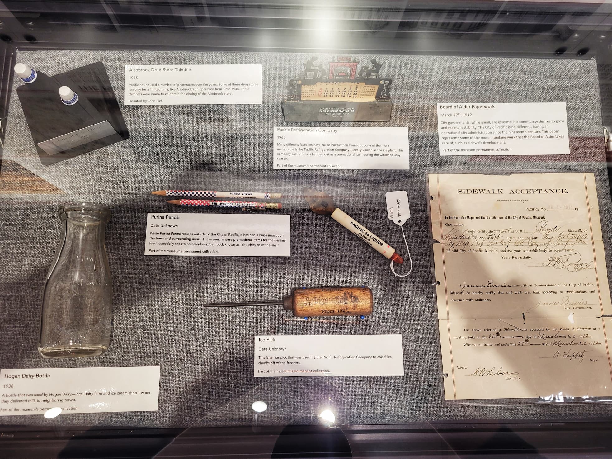 photo of display case of local artifacts at red cedar inn museum