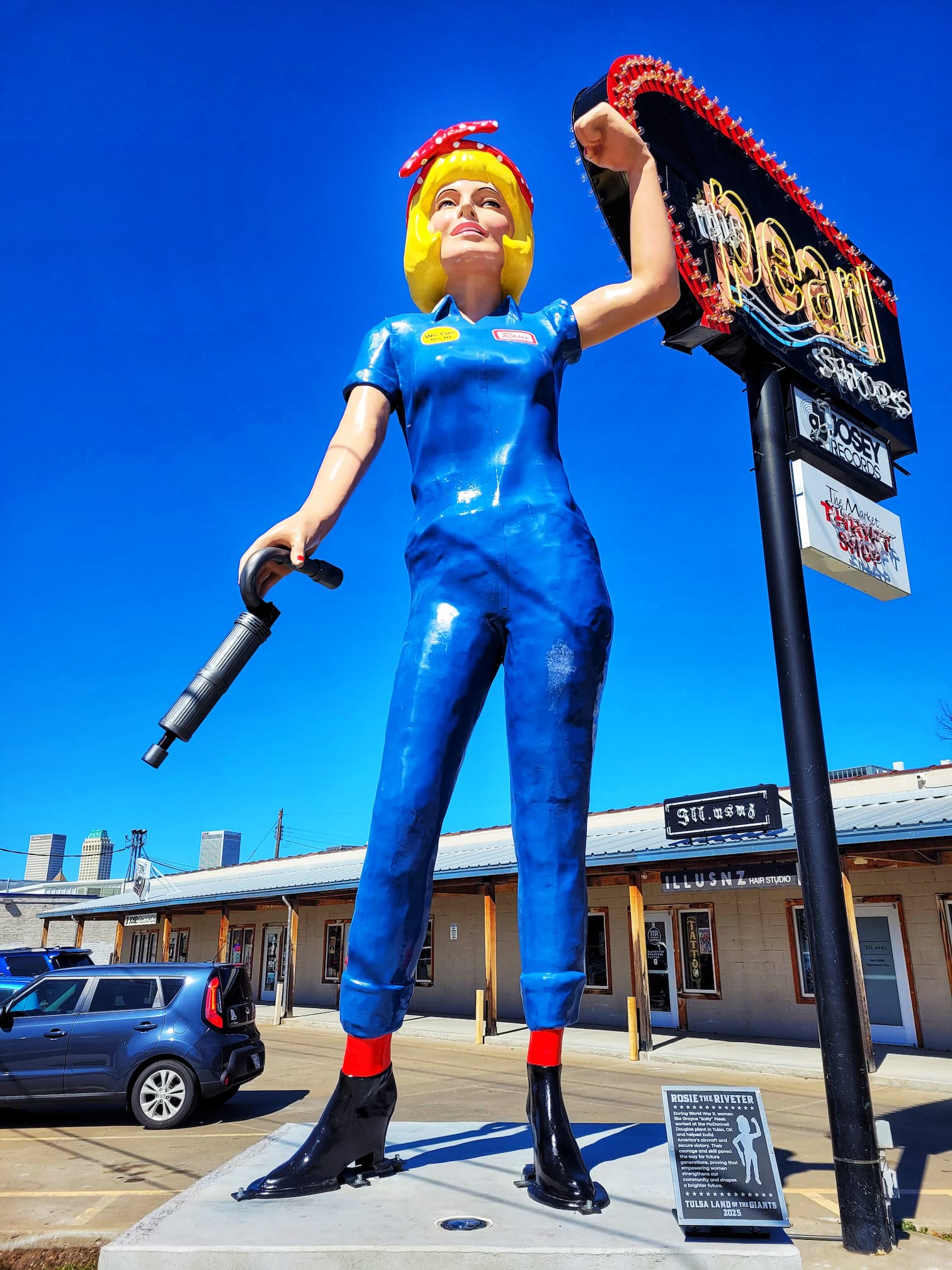 photo of rosier the riveter muffler man