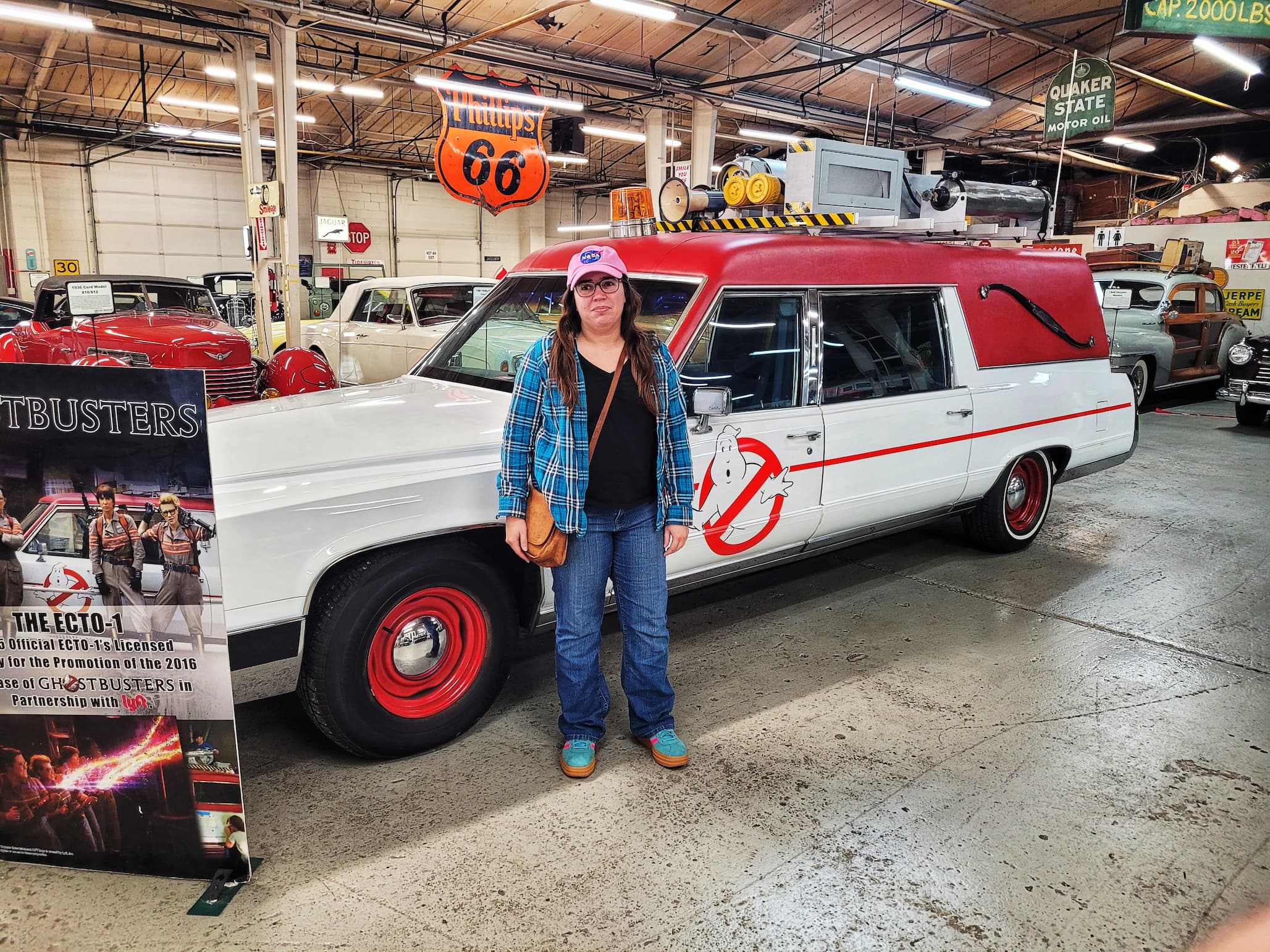 photo of jen in front of ghostbusters car