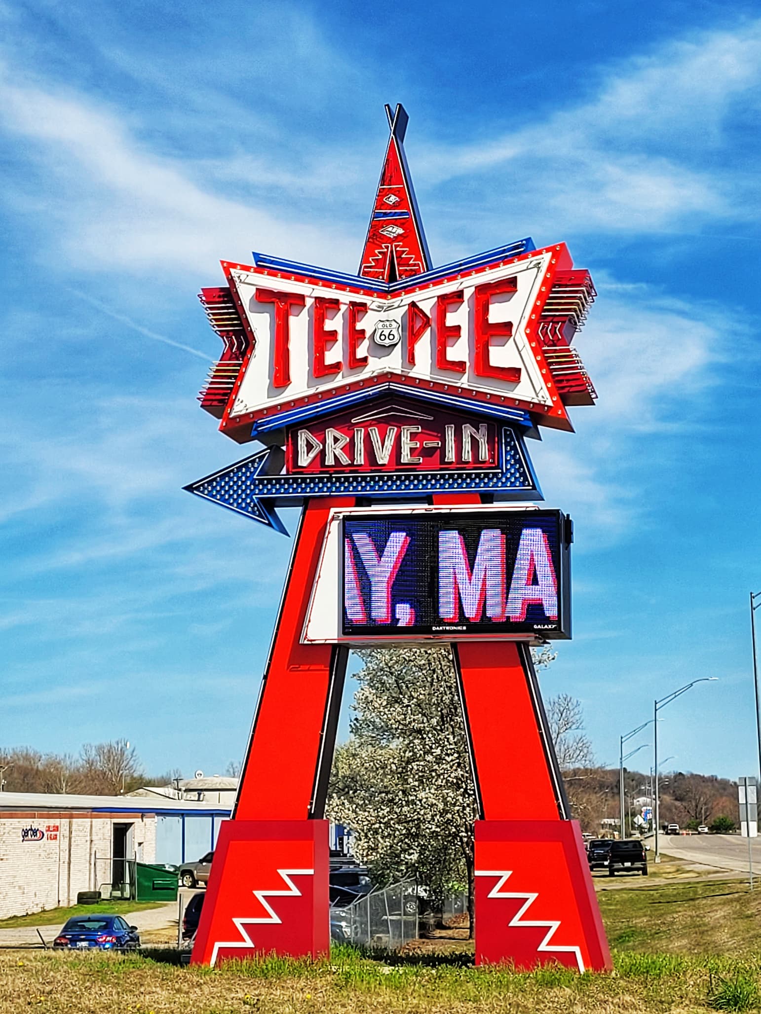 photo of tee pee drive-in neon sign