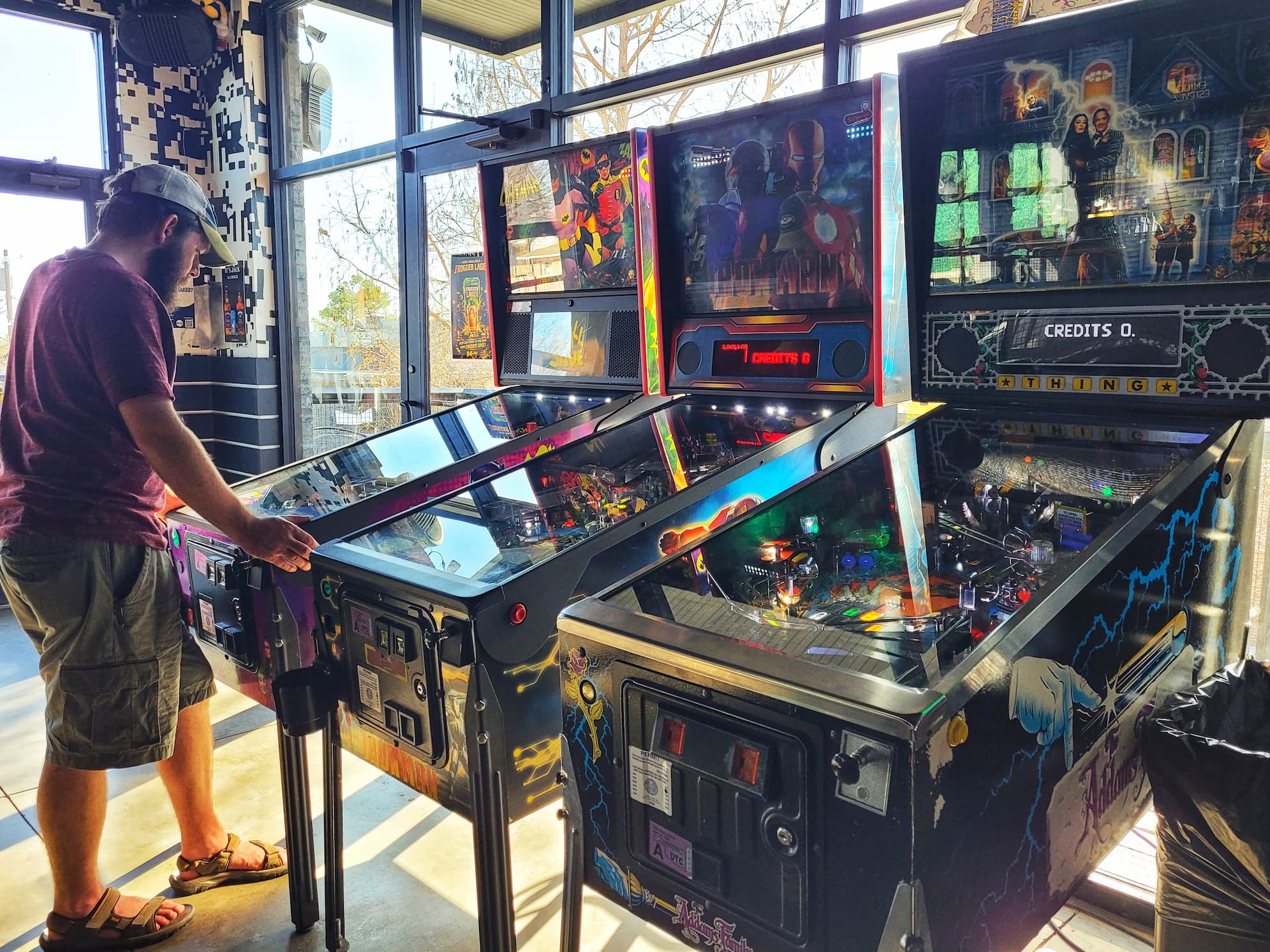 photo of josh playing  pinball at up down okc