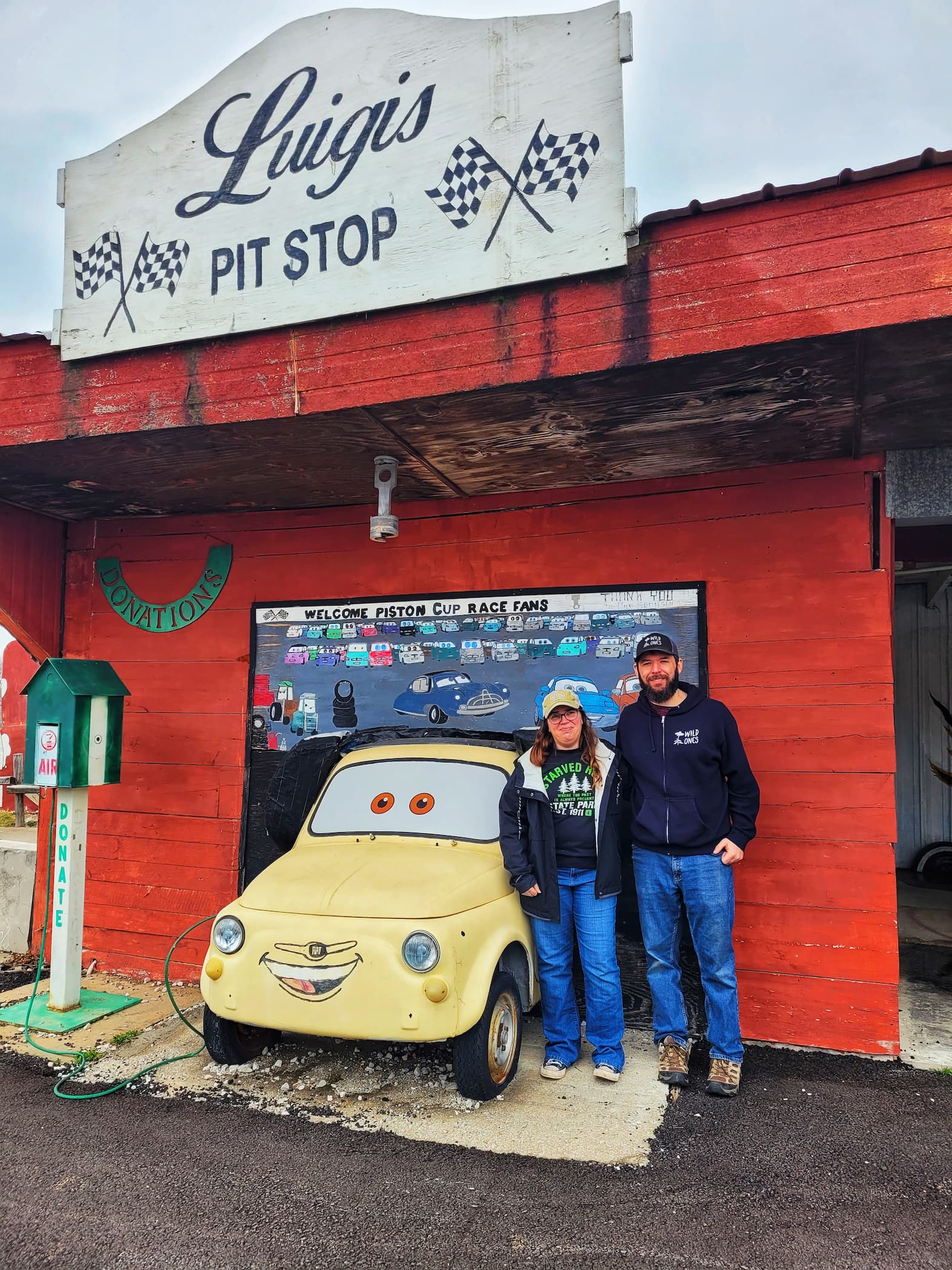 photo of us in front of luigi's pit stop photo op