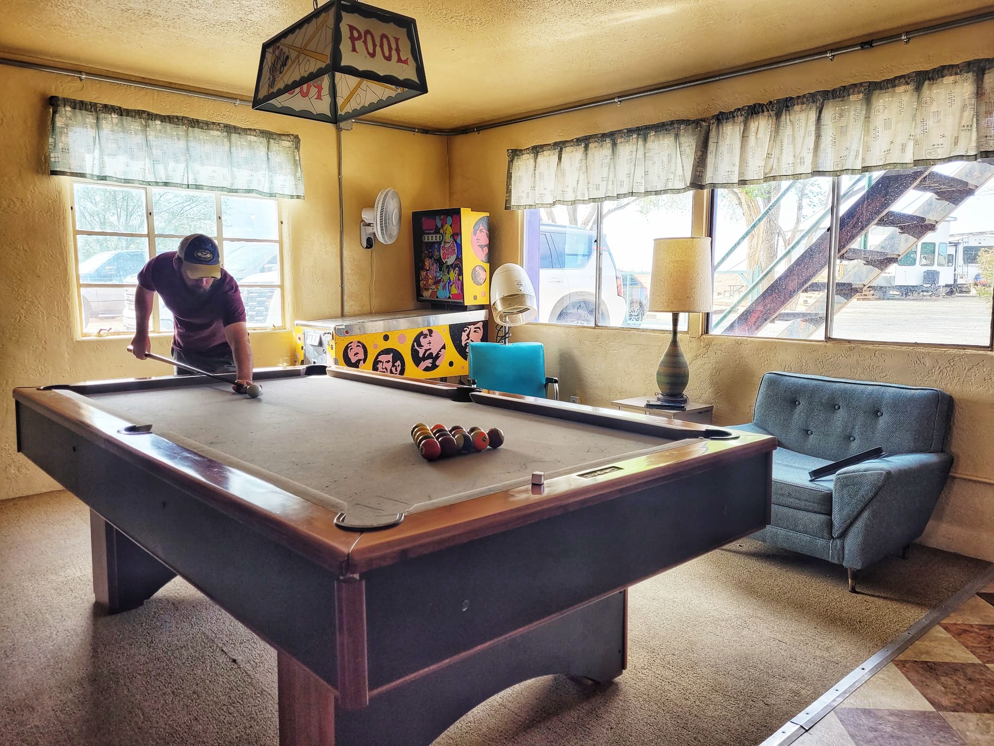 photo of  josh playing pool at enchanted trails rv park
