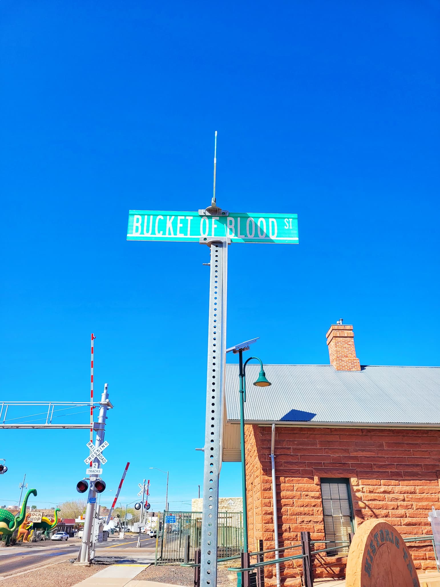 photo of bucket of blood street sign