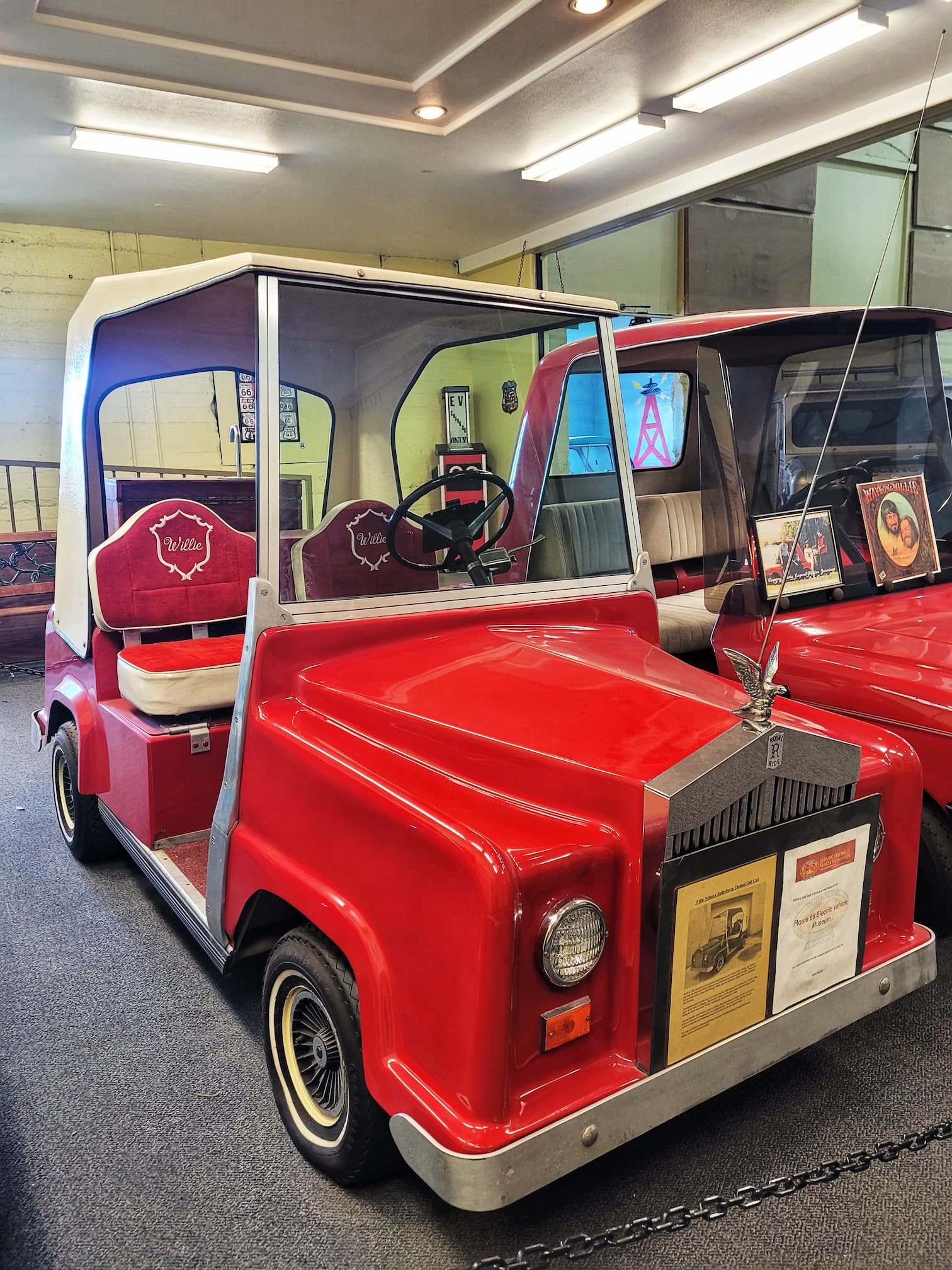 photo of willie nelson's golf cart at route 66 ev museum