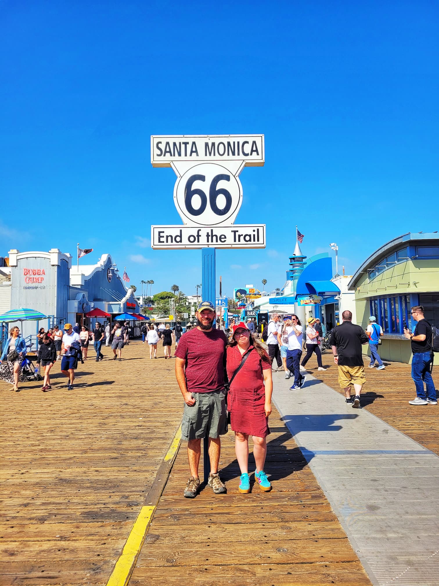 photo of us with end of route 66 sign