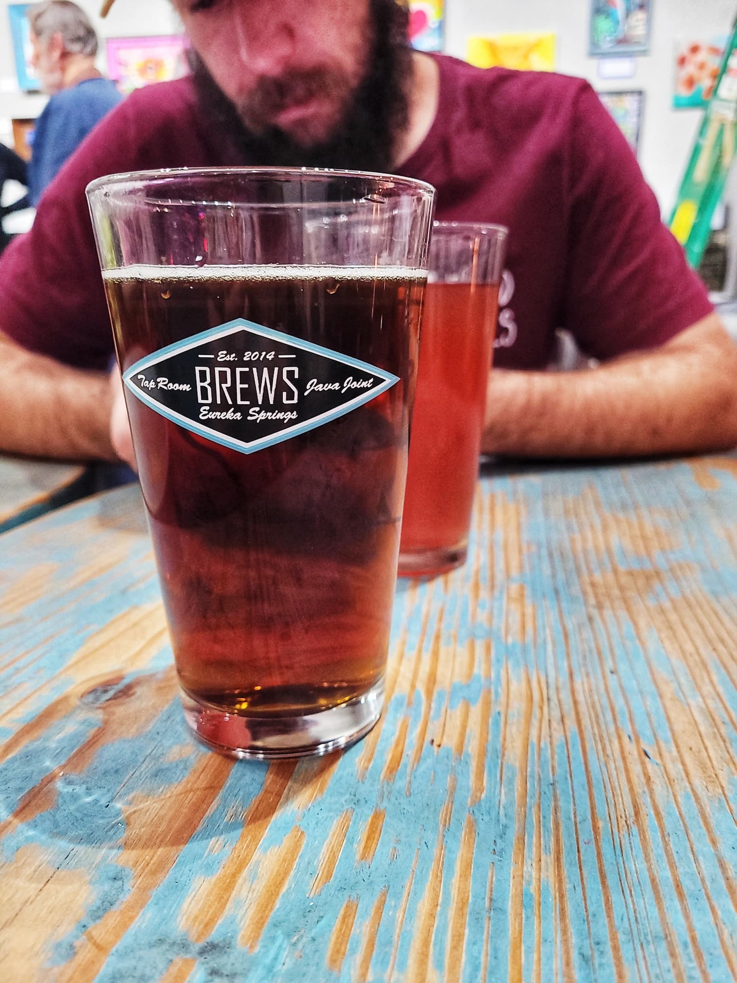 photo of beer glass at brews in eureka springs